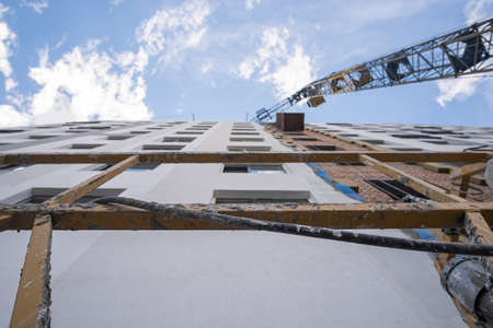 Construction site with crane and building, bottom view.の写真素材