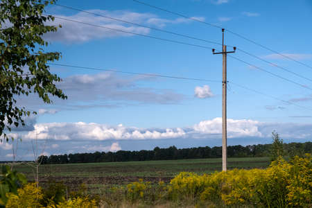 Remote communities. Power electric pole survived after the storm. High voltage survived during hurricaneの写真素材