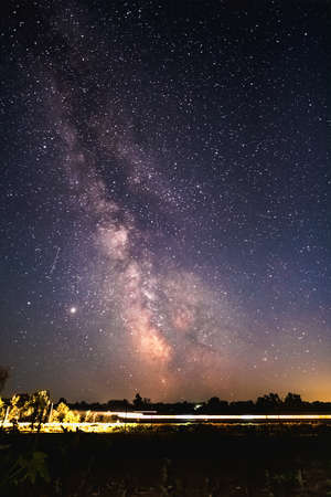 Milky Way Over Express Train at night sky.の写真素材