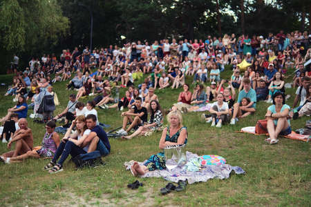 Zhytomyr, Ukraine - July 6, 2021: Group of beautiful people at concert at summer festival.のeditorial素材