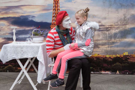 Zhytomyr, Ukraine - May 15, 2021: Professional mime artist performing different emotions and interacts with people. Mime playing with childrenのeditorial素材