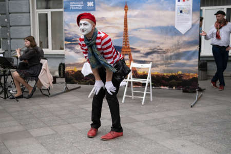 Zhytomyr, Ukraine - May 15, 2021: Professional mime artist performing different emotions and interacts with people.のeditorial素材