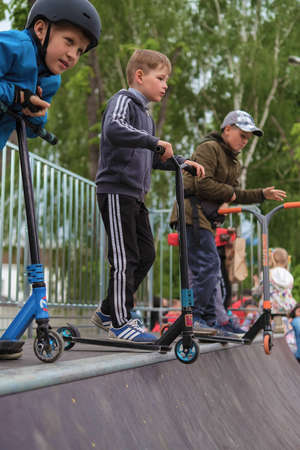 Zhytomyr, Ukraine - May 15, 2021: A young male skaters ready to show the trick.のeditorial素材