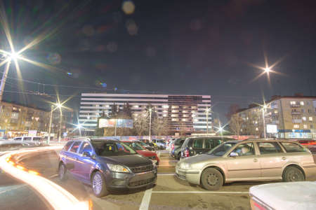 Zhytomyr, Ukraine - November 20, 2021: Cars in the parking lot in the evening. All places are taken to park the carのeditorial素材
