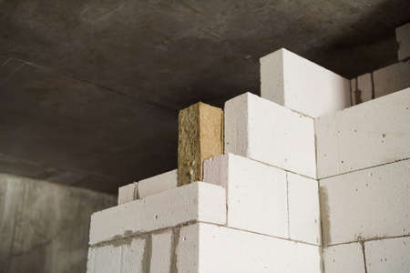 Unfinished wall inside the house. Aerated lightweight gypsum building concrete blocksの写真素材