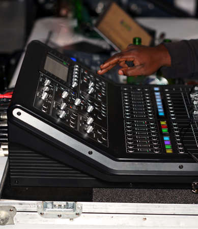 A digital mixing console on a live performance.