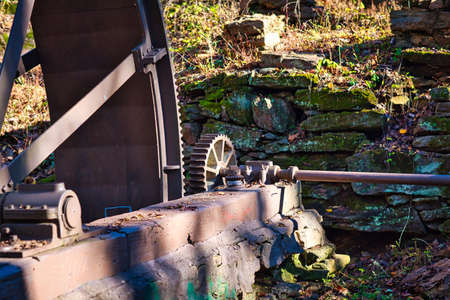 Large gears on a water wheel from an old grist mill where the building is no longer there.