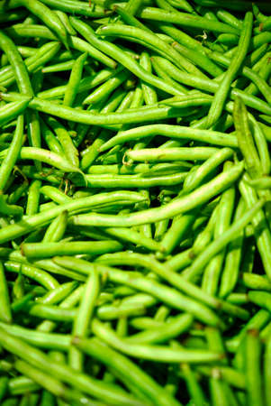 A close up of green beans in a farmers market.の写真素材