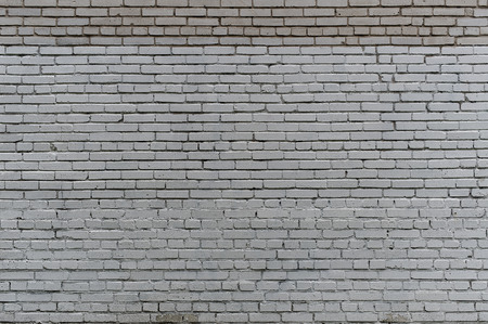 Wall from a white silicate brick. The irregular texture of the brickwork.の写真素材