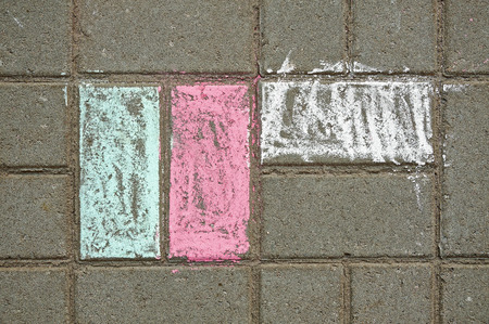 Colored chalk on the pavement tile.の写真素材