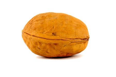 A macro closeup of a walnut isolated on white