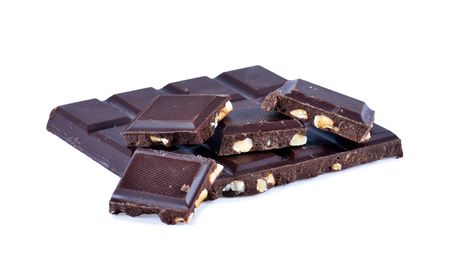 Pile of chocolate chunks. Isolated on white background