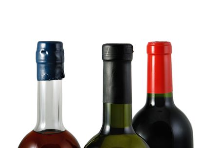 Red, pink and white bottles wine, isolated on white background.の写真素材