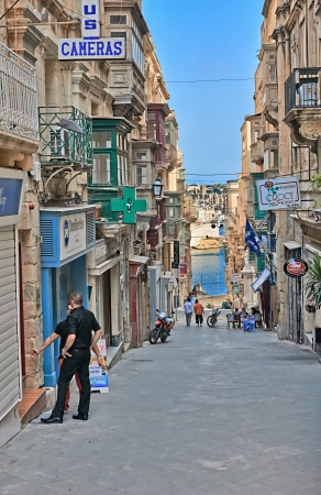 Valletta, Malta - SEPTEMBER 11, 2013  Typical street in the Malta  Malta is a southern European country in the Mediterranean Sea 80 km  50 mi  south of Sicily のeditorial素材