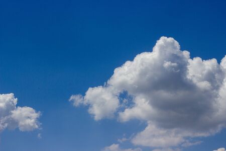 big white clouds look like elephant on blue sky
