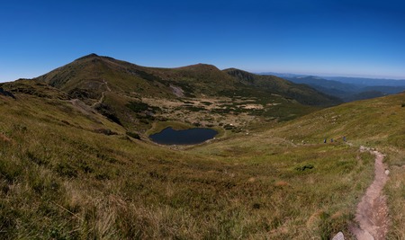 Carpathian mountains landscape, panorama view from the height, Nesamovyte lake under hillの写真素材
