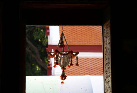 Beautiful garland hang at the windoe of the templeの写真素材