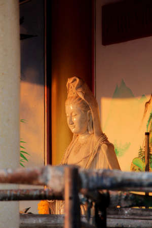 The sculpture of Guan Yin in the chainese temple の写真素材