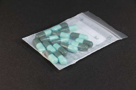 Antibiotics pills in the plastic zip bag の写真素材