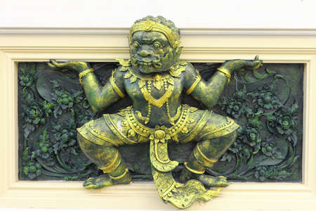 Stucco of male giant carry the templeの写真素材