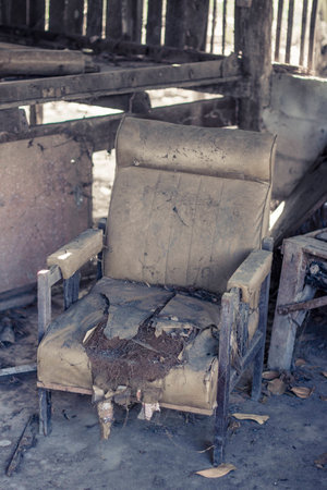 Old chair in the abandon house, the owner pass the time three years ago の写真素材