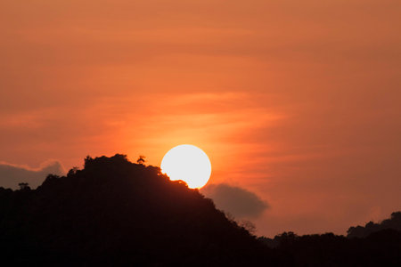 Sunset beyond the hillの写真素材