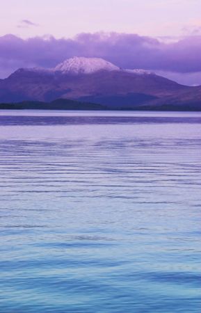 colorful sunset at Loch Lomond, Scotland, UK, with view to Ben Lomondの写真素材