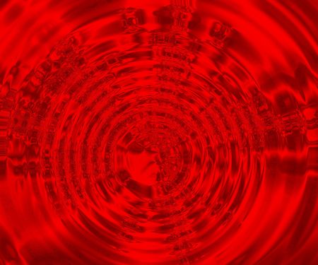 red background with concentric rings or ripplesの写真素材