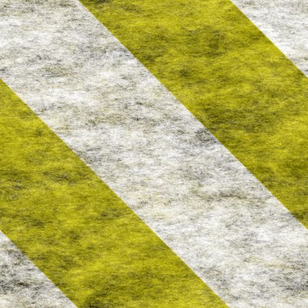 bold diagonal white and yellow warning / hazard stripes background, will tile seamlessly as a patternの写真素材