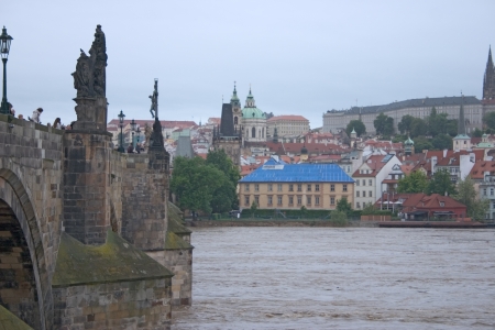 PRAGUE, CZECH REPUBLIC - JUNE 2: Swollen Vltava river with Charles Bridge, on June 2, 2013 in Prague, Czech Republicのeditorial素材