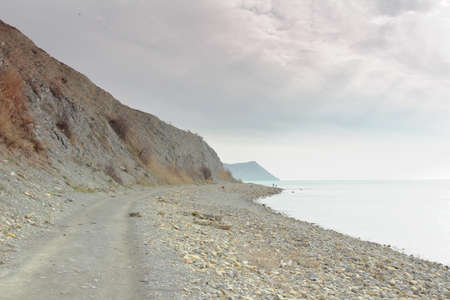 landscape road along the rocky seashoreの写真素材