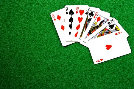 Playing cards on felt