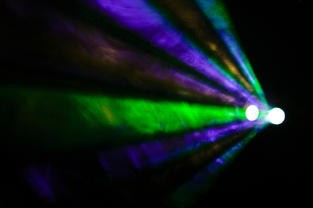 disco background. color lasers in smoke. Side viewの写真素材