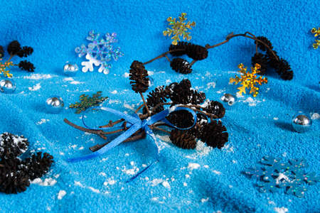 New Year's background. Christmas toys on a blue background side viewの写真素材