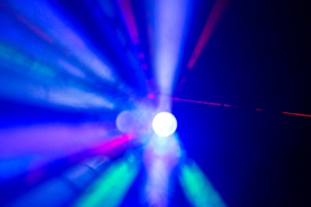 disco background. color lasers in smoke. Side viewの写真素材