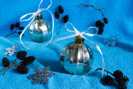 New Year's background. Christmas toys on a blue background side viewの写真素材