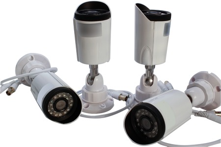 Surveillance camera on a white background. isolation . side view