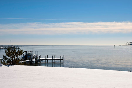 Winter snow covered shoreの写真素材