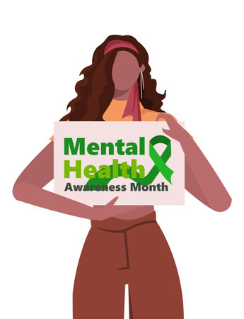 Mental Health Awareness Month. A young African American woman in casual clothes holds a banner in her hands with the inscription Mental Health Awareness Month. Green ribbon.のイラスト素材