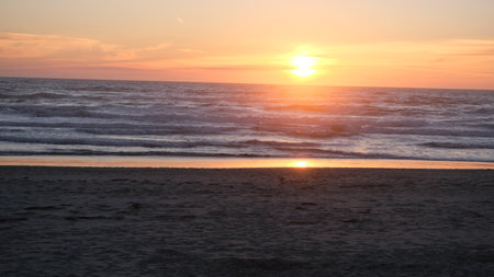 Sunset on the beach of Playa de las Nieves, Costa Ricaの写真素材