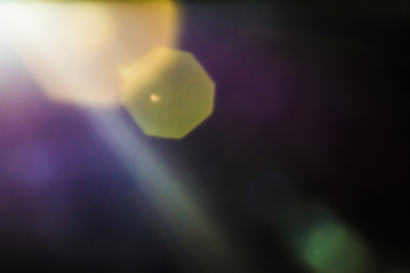 Dark overlay background of blue LED lights with bokeh effect. Includes copy space.の写真素材