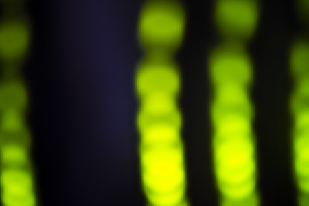 Colorful soft circular overlay for use to enhance images with copy space on a deep twilight green...