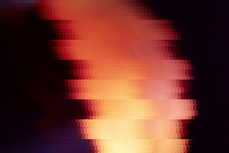 Polygonal red colored light beams in center of solid black background with copy spaceの写真素材