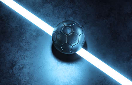 Centered futuristic black futsal ball close-up on white line of an indoor soccer field backgroundの写真素材
