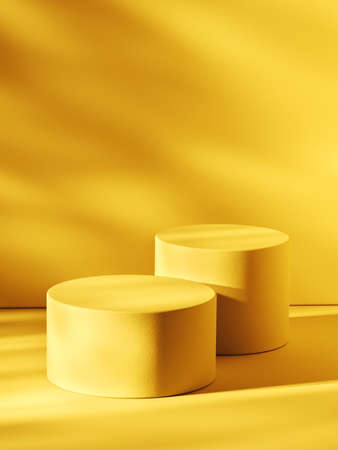 Pair of empty cylindrical pedestals, yellow toned image. 3d computer graphic template of displaying place for your products. Blank template.の写真素材
