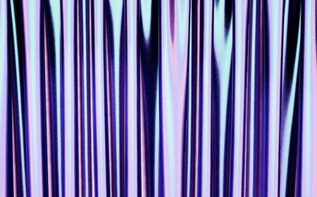 Psychedelic curtain with iridescent metallic color gradient. Close up 3d render as vertical design template or web and product bannerの写真素材