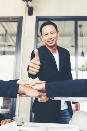Stack hands of business people join hand together. Business People Teamwork Collaboration Relation Concept.の写真素材