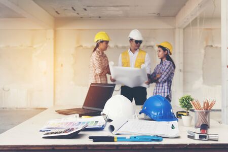 Handsome engineer working in construction site. construction concept