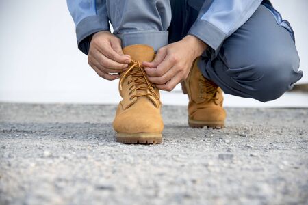 Man wear brown boots. Travel Concept.