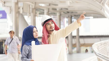 Team Arab collaborator business man and businesswoman city view background.の写真素材
